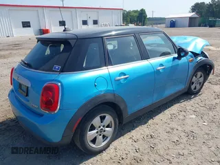 2015 MINI Hardtop 4 Door with VIN WMWXS5C56FT831505, listed as a IAAI auction lot 42155398 with 95,693 mi miles and . Bid and sale history available at DreamBid. Image 4.