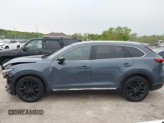2023 Mazda CX-9 Grand Touring with VIN JM3TCBDY2P0636226, listed as a IAAI auction lot 42384360 with 161,352 mi miles and . Bid and sale history available at DreamBid. Image 15.