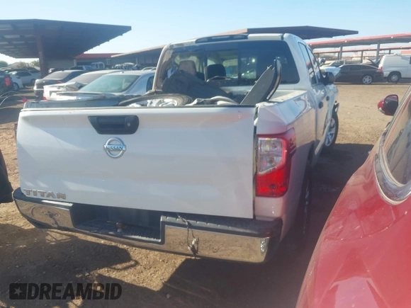 2018 Nissan Titan SV with VIN 1N6AA1EK9JN533760, listed as a IAAI auction lot 41512624 with 84,743 mi miles. Bid and sale history available at carsss.com. Image 4.