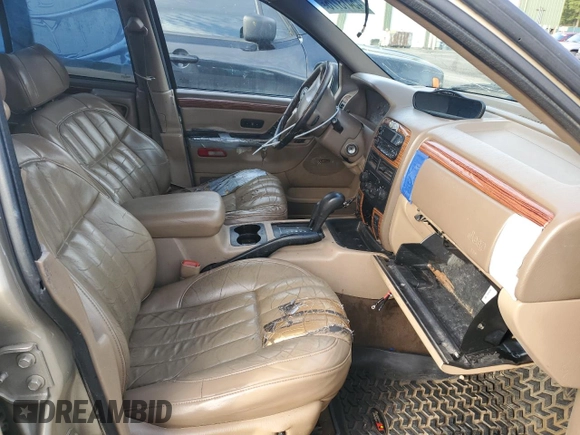 1999 Jeep Grand Cherokee Limited with VIN 1J4GW68N2XC581746, listed as a Copart auction lot 45413775 with 284,226 mi miles and Salvage Title. Bid and sale history available at carsss.com. Image 7.
