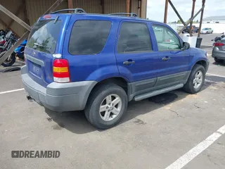 2005 Ford Escape XLT with VIN 1FMYU93195KA35708, listed as a IAAI auction lot 42130239 with 230,920 mi miles. Bid and sale history available at carsss.com. Image 4.