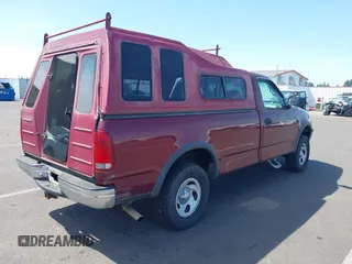 1998 Ford F-150 with VIN 1FTZF182XWKA36602, listed as a IAAI auction lot 42472442 with 112,235 mi miles and . Bid and sale history available at DreamBid. Image 4.