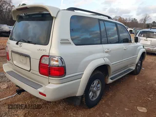 2000 Lexus LX 470 z VIN JT6HT00W9Y0103225, wystawiony jako IAAI lot #41148826 z przebiegiem 270 351 mil mil oraz . Historia ofert i sprzedaży dostępna na DreamBid. Obrazek 4.