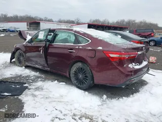 2016 Toyota Avalon Limited with VIN 4T1BK1EB6GU221765, listed as a IAAI auction lot 41264619 with 77,574 mi miles. Bid and sale history available at carsss.com. Image 3.