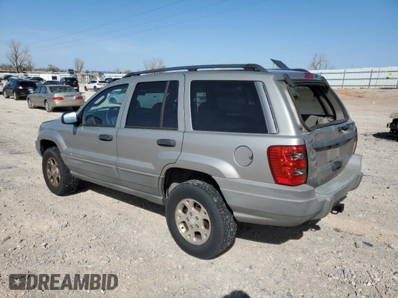 2002 Jeep Grand Cherokee with VIN 1J4GX38S82C178199, listed as a Copart auction lot 48996515 with 299,780 mi miles and Salvage title. Bid and sale history available at DreamBid. Image 2.
