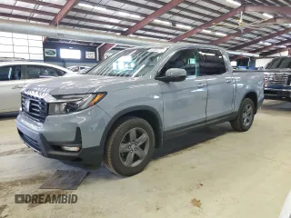 2023 Honda Ridgeline RTL-E z VIN 5FPYK3F77PB001460, wystawiony jako Copart lot #61383785 z przebiegiem 27 423 mil mil oraz Szkoda całkowita • Salvage title. Historia ofert i sprzedaży dostępna na DreamBid. Obrazek 1.