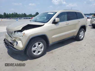 2011 Jeep Grand Cherokee Laredo with VIN 1J4RR4GG6BC670767, listed as a Copart auction lot 62102195 with 117,547 mi miles and Salvage title. Bid and sale history available at DreamBid. Image 1.