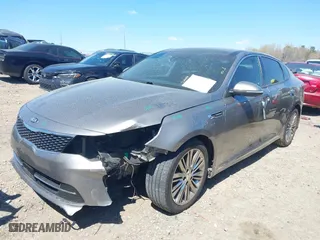 2018 Kia Optima SX with VIN 5XXGV4L26JG187281, listed as a IAAI auction lot 41887939 with 124,782 mi miles. Bid and sale history available at carsss.com. Image 2.