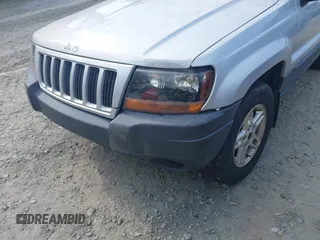 2004 Jeep Grand Cherokee Laredo z VIN 1J4GW48S54C106405, wystawiony jako IAAI lot #42315689 z przebiegiem 104 416 mil mil oraz . Historia ofert i sprzedaży dostępna na DreamBid. Obrazek 6.