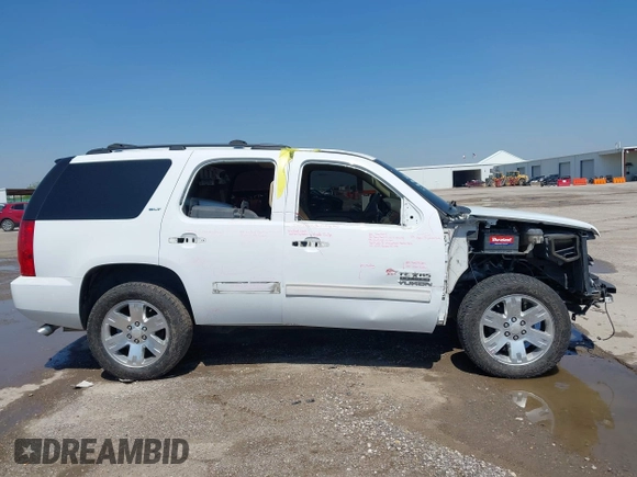 2011 GMC Yukon SLT z VIN 1GKS1CE00BR210794, wystawiony jako IAAI lot #41958998 z przebiegiem 225 407 mil mil oraz . Historia ofert i sprzedaży dostępna na DreamBid. Obrazek 14.