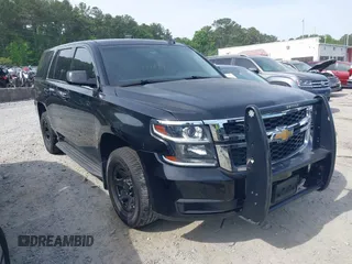 2016 Chevrolet Tahoe Commercial z VIN 1GNSKDEC9GR351872, wystawiony jako IAAI lot #42239404 z przebiegiem 144 693 mil mil oraz . Historia ofert i sprzedaży dostępna na DreamBid. Obrazek 1.