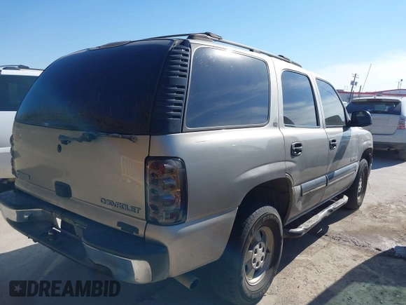 2001 Chevrolet Tahoe LS z VIN 1GNEC13T61R208266, wystawiony jako IAAI lot #41370967 z przebiegiem 378 105 mil mil oraz . Historia ofert i sprzedaży dostępna na DreamBid. Obrazek 4.