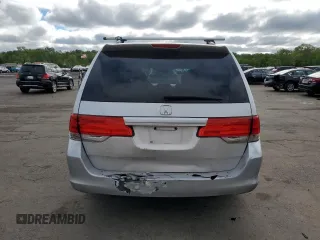 2010 Honda Odyssey EX z VIN 5FNRL3H43AB095521, wystawiony jako Copart lot #57322365 z przebiegiem 208 226 mil mil oraz Szkoda całkowita • Salvage title. Historia ofert i sprzedaży dostępna na DreamBid. Obrazek 6.