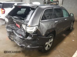2015 Jeep Grand Cherokee Overland with VIN 1C4RJFCT2FC613502, listed as a Copart auction lot 89207005 with 124,482 mi miles and Salvage Title. Bid and sale history available at carsss.com. Image 3.