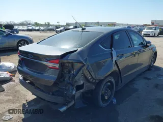 2017 Ford Fusion SE z VIN 3FA6P0H79HR412250, wystawiony jako IAAI lot #41984265 z przebiegiem 108 106 mil mil oraz . Historia ofert i sprzedaży dostępna na DreamBid. Obrazek 4.