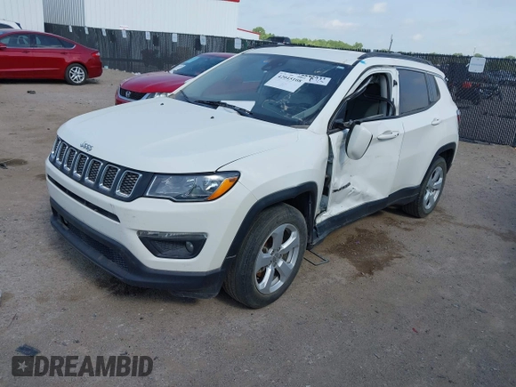 2021 Jeep Compass Latitude with VIN 3C4NJCBBXMT563942, listed as a IAAI auction lot 42045108 with 166,153 mi miles and . Bid and sale history available at DreamBid. Image 2.