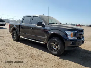 2019 Ford F-150 XL with VIN 1FTEW1E44KKE22110, listed as a Copart auction lot 61221835 with 111,308 mi miles and Clean title. Bid and sale history available at DreamBid. Image 4.