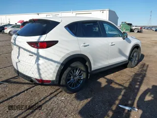 2017 Mazda CX-5 Touring with VIN JM3KFBCL4H0125501, listed as a IAAI auction lot 41979179 with 109,926 mi miles. Bid and sale history available at carsss.com. Image 4.