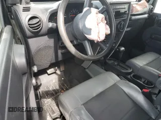 2009 Jeep Wrangler X z VIN 1J4FA24169L706787, wystawiony jako Copart lot #51540265 z przebiegiem 126 934 mil mil oraz Szkoda całkowita • Salvage title. Historia ofert i sprzedaży dostępna na DreamBid. Obrazek 8.