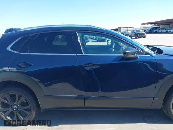2021 Mazda CX-30 Premium with VIN 3MVDMBDYXMM307047, listed as a IAAI auction lot 41974966 with 53,409 mi miles and . Bid and sale history available at carsss.com. Image 14.
