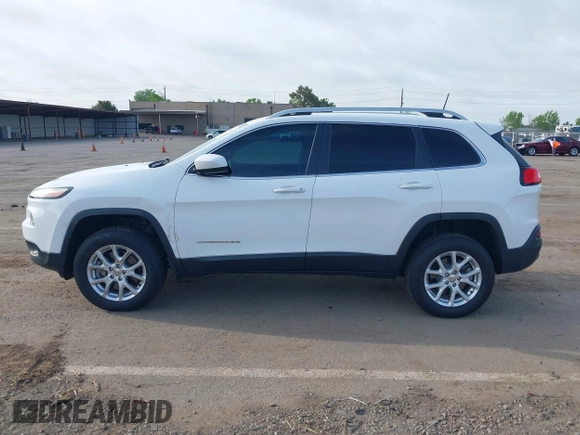 2016 Jeep Cherokee Latitude with VIN 1C4PJMCS1GW185442, listed as a IAAI auction lot 42033699 with 123,306 mi miles. Bid and sale history available at carsss.com. Image 14.