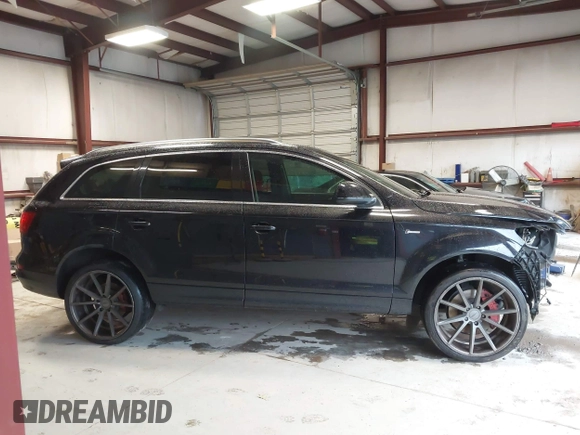2014 Audi Q7 Premium Plus with VIN WA1LGAFE7ED003294, listed as a IAAI auction lot 42318454 with 113,719 mi miles and . Bid and sale history available at DreamBid. Image 14.