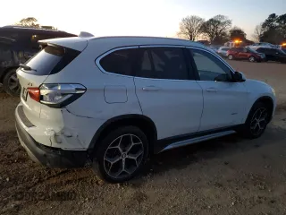 2017 BMW X1 sDrive28i with VIN WBXHU7C37H5H34418, listed as a Copart auction lot 47982795 with 67,980 mi miles and Salvage Title. Bid and sale history available at carsss.com. Image 3.