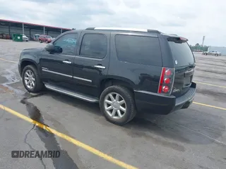 2013 GMC Yukon Denali with VIN 1GKS2EEF7DR306177, listed as a IAAI auction lot 42046734 with 263,976 mi miles. Bid and sale history available at carsss.com. Image 3.