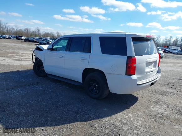 2020 Chevrolet Tahoe Commercial with VIN 1GNSKDEC2LR217697, listed as a IAAI auction lot 40815499 with 128,503 mi miles. Bid and sale history available at carsss.com. Image 3.
