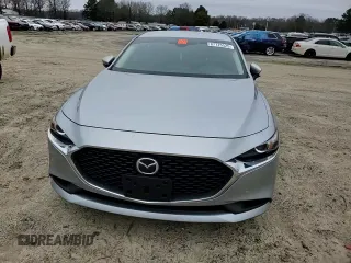 2021 Mazda 3 2.0 with VIN JM1BPAA78M1314033, listed as a Copart auction lot 87725525 with 58,876 mi miles and Salvage Title. Bid and sale history available at DreamBid. Image 11.