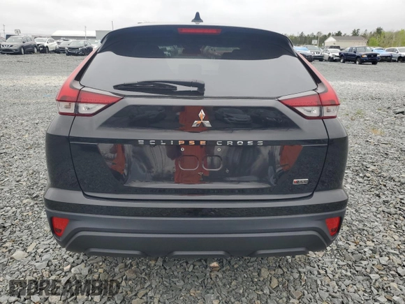 2022 Mitsubishi Eclipse Cross ES with VIN JA4ATUAA0NZ605000, listed as a Copart auction lot 57465995 with 28,712 mi miles and Salvage title. Bid and sale history available at DreamBid. Image 6.