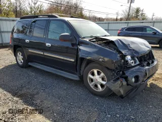 2003 GMC Envoy SLT z VIN 1GKET16PX36243554, wystawiony jako Copart lot #49083975 z przebiegiem 148 596 mil mil oraz Szkoda całkowita • Salvage title. Historia ofert i sprzedaży dostępna na DreamBid. Obrazek 4.