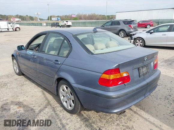 2005 BMW 3 Series 325i with VIN WBAET37445NJ85538, listed as a IAAI auction lot 41872686 with 121,237 mi miles. Bid and sale history available at carsss.com. Image 3.