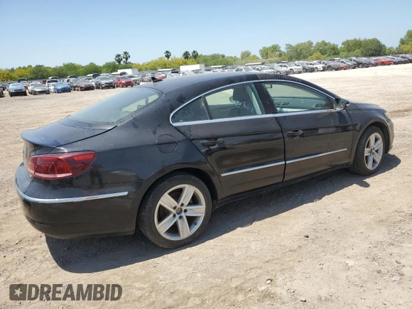 2013 Volkswagen CC R-Line z VIN WVWBN7AN3DE512289, wystawiony jako Copart lot #51865735 z przebiegiem 69 799 mil mil oraz Szkoda całkowita • Salvage title. Historia ofert i sprzedaży dostępna na DreamBid. Obrazek 3.