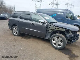 2014 Dodge Durango Limited with VIN 1C4SDJDTXEC345520, listed as a IAAI auction lot 41406601 with 148,216 mi miles. Bid and sale history available at carsss.com. Image 1.