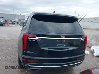 2023 Cadillac XT6 FWD Luxury with VIN 1GYKPAR44PZ114020, listed as a IAAI auction lot 41669115 with 110,305 mi miles. Bid and sale history available at carsss.com. Image 17.