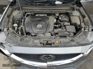 2020 Mazda CX-5 Touring with VIN JM3KFACM6L0797748, listed as a Copart auction lot 44573645 with 104,094 mi miles and Salvage Title. Bid and sale history available at carsss.com. Image 13.