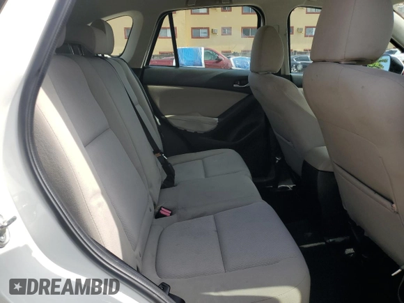 2014 Mazda CX-5 Sport with VIN JM3KE2BE9E0344990, listed as a Copart auction lot 59014145 with 126,905 mi miles and Salvage title. Bid and sale history available at DreamBid. Image 10.