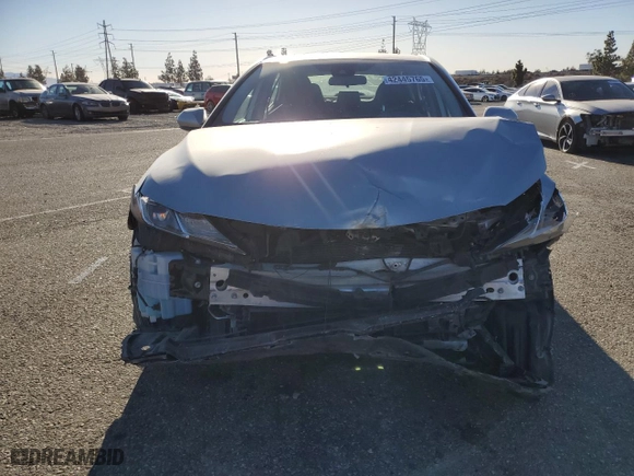 2021 Toyota Camry Hybrid LE with VIN 4T1C31AK7MU027068, listed as a Copart auction lot 42445765 with 77,632 mi miles and Salvage Title. Bid and sale history available at carsss.com. Image 5.