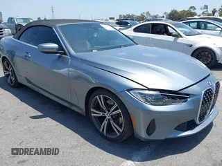 2021 BMW 4 Series 430i z VIN WBA23AT08MCH12990, wystawiony jako IAAI lot #42347582 z przebiegiem 21 327 mil mil oraz . Historia ofert i sprzedaży dostępna na DreamBid. Obrazek 1.