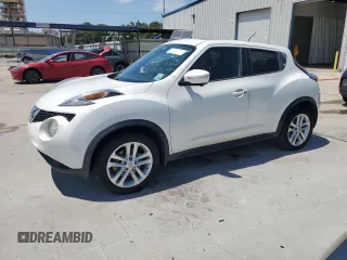 2015 Nissan Juke S with VIN JN8AF5MRXFT504060, listed as a Copart auction lot 57169085 with 112,168 mi miles and Salvage title. Bid and sale history available at DreamBid. Image 1.