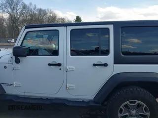 2015 Jeep Wrangler Unlimited Rubicon with VIN 1C4BJWFGXFL507315, listed as a IAAI auction lot 42059720 with 90,189 mi miles and . Bid and sale history available at DreamBid. Image 14.