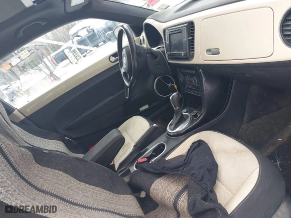 2019 Volkswagen Beetle S with VIN 3VWFD7AT1KM703684, listed as a IAAI auction lot 41571691 with 111,180 mi miles. Bid and sale history available at carsss.com. Image 5.