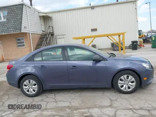 2014 Chevrolet Cruze LS z VIN 1G1PA5SG0E7171051, wystawiony jako IAAI lot #41898051 z przebiegiem 114 087 mil mil oraz . Historia ofert i sprzedaży dostępna na DreamBid. Obrazek 13.