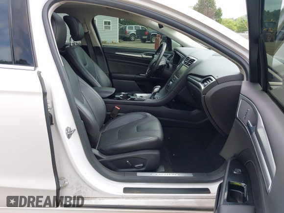 2014 Ford Fusion Titanium с VIN 3FA6P0K97ER352345, выставлен на аукционе IAAI как лот 42370970 с пробегом 182 895 миль миль и . История ставок и продаж доступна на DreamBid. Изображение 5.