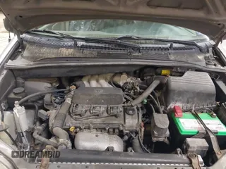 1999 Toyota Sienna LE z VIN 4T3ZF13CXXU127488, wystawiony jako IAAI lot #42334323 z przebiegiem 247 917 mil mil oraz . Historia ofert i sprzedaży dostępna na DreamBid. Obrazek 10.