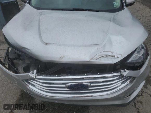 2019 Ford Edge Titanium с VIN 2FMPK3K95KBB22694, выставлен на аукционе Copart как лот 58660475 с пробегом 144 615 миль миль и Списание • Salvage title. История ставок и продаж доступна на DreamBid. Изображение 12.