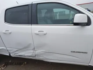 2016 Chevrolet Colorado 4WD LT z VIN 1GCGTCE34G1314152, wystawiony jako IAAI lot #42328625 z przebiegiem 129 517 mil mil oraz . Historia ofert i sprzedaży dostępna na DreamBid. Obrazek 14.