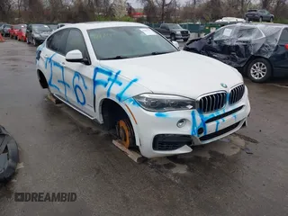 2015 BMW X6 xDrive50i z VIN 5UXKU6C50F0F94266, wystawiony jako IAAI lot #41887479 z przebiegiem Nie podano mil oraz . Historia ofert i sprzedaży dostępna na DreamBid. Obrazek 1.