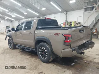 2024 Nissan Frontier SV with VIN 1N6ED1EK8RN613989, listed as a IAAI auction lot 42310148 with 14,202 mi miles and . Bid and sale history available at DreamBid. Image 3.